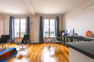 Coin salon dans l'établissement Comfort and tranquility near the Canal de l Ourcq