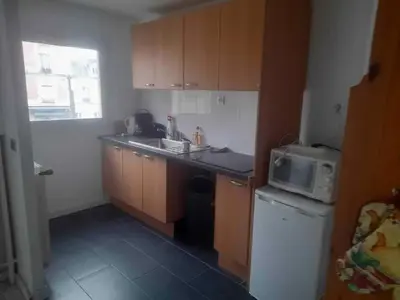Cuisine ou kitchenette dans l'établissement Appartement calme & proche Paris
