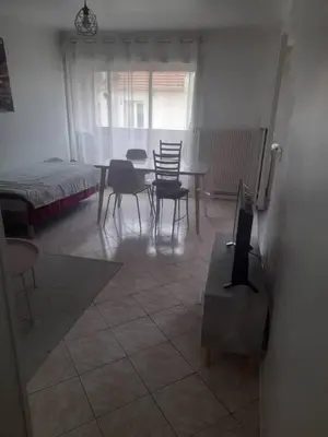 Coin salon dans l'établissement Appartement calme & proche Paris