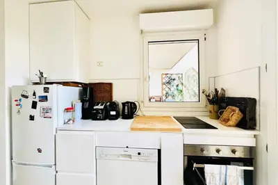 Cuisine ou kitchenette dans l'établissement Direct Tour Eiffel Métro L9