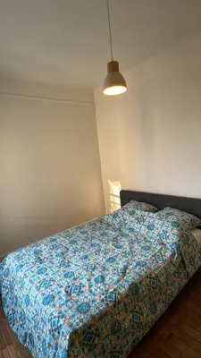 Un ou plusieurs lits dans un hébergement de l'établissement Appartement proche Roland Garros