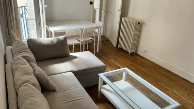 Coin salon dans l'établissement Appartement proche Roland Garros