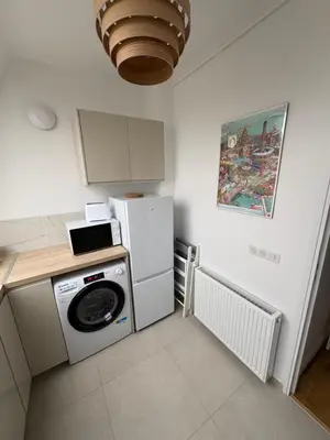 Cuisine ou kitchenette dans l'établissement Sur les toits de Paris