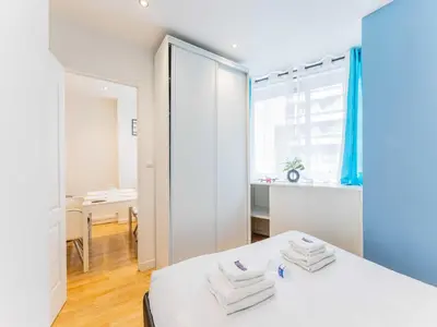 Un ou plusieurs lits dans un hébergement de l'établissement Quiet apartment - 1BR 4P - Sacré Coeur