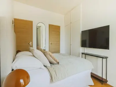 Télévision ou salle de divertissement dans l'établissement Charming flat -1BR-4P- Paris 17e