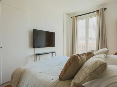 Un ou plusieurs lits dans un hébergement de l'établissement Charming flat -1BR-4P- Paris 17e