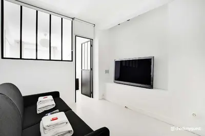 Télévision ou salle de divertissement dans l'établissement Amazing apartment - 3BR 6P - Near Convention