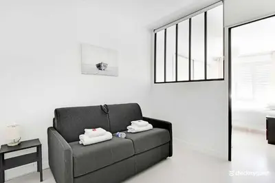 Coin salon dans l'établissement Amazing apartment - 3BR 6P - Near Convention