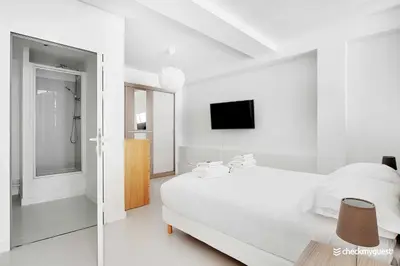 Un ou plusieurs lits dans un hébergement de l'établissement Amazing apartment - 3BR 6P - Near Convention