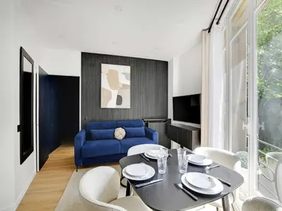 Télévision ou salle de divertissement dans l'établissement Magnificent 2BD 6P apartment - Eiffel Tower