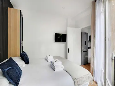 Un ou plusieurs lits dans un hébergement de l'établissement Magnificent 2BD 6P apartment - Eiffel Tower
