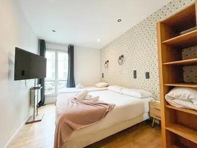 Un ou plusieurs lits dans un hébergement de l'établissement Urban Flat 104 - 4 Bedroom Flat Opera
