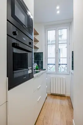 Cuisine ou kitchenette dans l'établissement CozyStudioParis-Montmartre-Opera