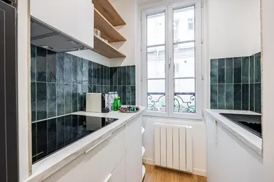 Cuisine ou kitchenette dans l'établissement CozyStudioParis-Montmartre-Opera