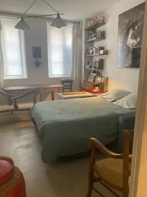 Un ou plusieurs lits dans un hébergement de l'établissement Suite Panthéon-Hôtel Particulier Historique