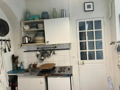 Cuisine ou kitchenette dans l'établissement Suite Panthéon-Hôtel Particulier Historique