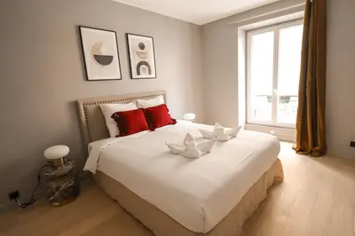Un ou plusieurs lits dans un hébergement de l'établissement Appartement cosy Tour Eiffel-Invalides