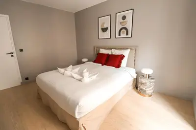 Un ou plusieurs lits dans un hébergement de l'établissement Appartement cosy Tour Eiffel-Invalides
