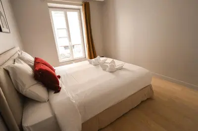 Un ou plusieurs lits dans un hébergement de l'établissement Appartement cosy Tour Eiffel-Invalides