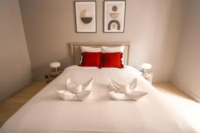 Un ou plusieurs lits dans un hébergement de l'établissement Appartement cosy Tour Eiffel-Invalides