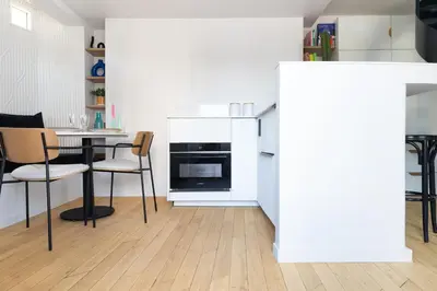 Cuisine ou kitchenette dans l'établissement Mini loft in Notre Dame district, Île Saint-Louis, Paris