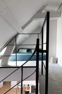 Un ou plusieurs lits dans un hébergement de l'établissement Mini loft in Notre Dame district, Île Saint-Louis, Paris