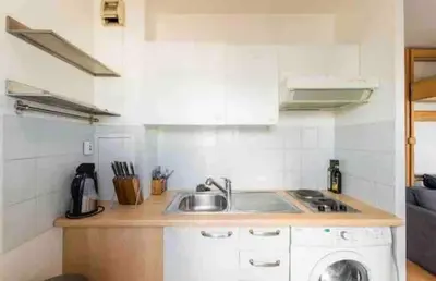 Cuisine ou kitchenette dans l'établissement Petit paradis
