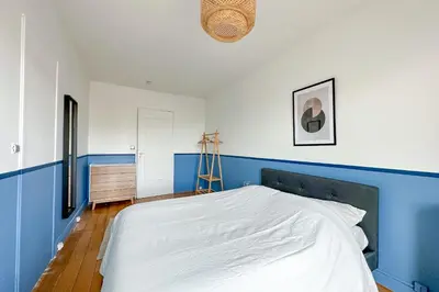 Un ou plusieurs lits dans un hébergement de l'établissement Beautiful private room in a Parisian shared apartment - Flexliving