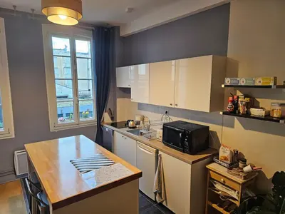 Cuisine ou kitchenette dans l'établissement A modern appartment, bright and calm