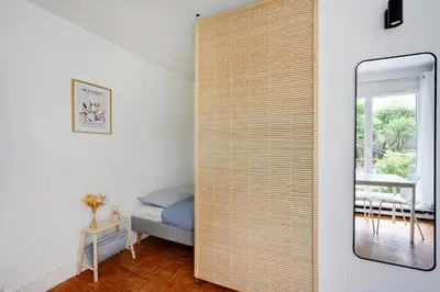 Un ou plusieurs lits dans un hébergement de l'établissement Studio Dumas - Charonne by B'Your Home