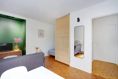 Un ou plusieurs lits dans un hébergement de l'établissement Studio Dumas - Charonne by B'Your Home