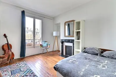 Un ou plusieurs lits dans un hébergement de l'établissement Nice haussmannian apartment in Paris
