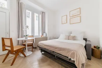 Un ou plusieurs lits dans un hébergement de l'établissement Cozy studio in Montmartre