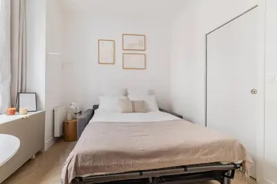 Un ou plusieurs lits dans un hébergement de l'établissement Cozy studio in Montmartre