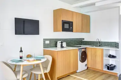 Cuisine ou kitchenette dans l'établissement 524 Suite Sandra - Charming apartment Paris 18eme