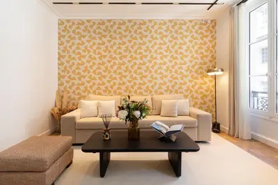 Coin salon dans l'établissement Oniri - Serviced Apartments in Louvre - Rue de Richelieu