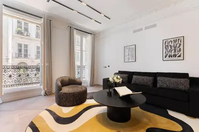 Coin salon dans l'établissement Oniri - Serviced Apartments in Louvre - Rue de Richelieu