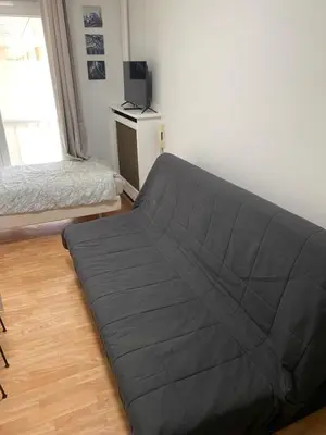 Un ou plusieurs lits dans un hébergement de l'établissement Studio cosy en plein cœur de Paris