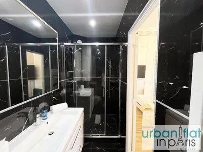 Salle de bains dans l'établissement Urban Flat 107 - Sublime 4 Bedroom Opera Paris