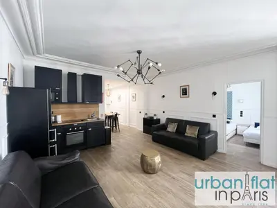Coin salon dans l'établissement Urban Flat 107 - Sublime 4 Bedroom Opera Paris