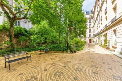 Jardin de l'établissement GuestReady - Refined Stay near the Eiffel Tower
