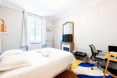 Télévision ou salle de divertissement dans l'établissement GuestReady - Refined Stay near the Eiffel Tower