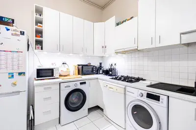 Cuisine ou kitchenette dans l'établissement GuestReady - Refined Stay near the Eiffel Tower