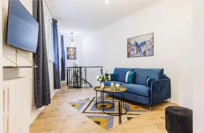 Télévision ou salle de divertissement dans l'établissement Beautiful duplex - 2BR 6P - Near Montmartre