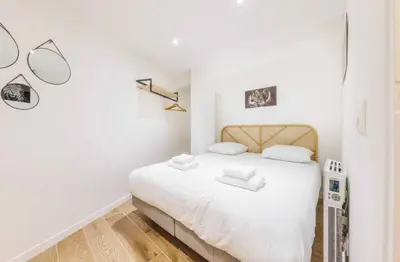 Un ou plusieurs lits dans un hébergement de l'établissement Beautiful duplex - 2BR 6P - Near Montmartre