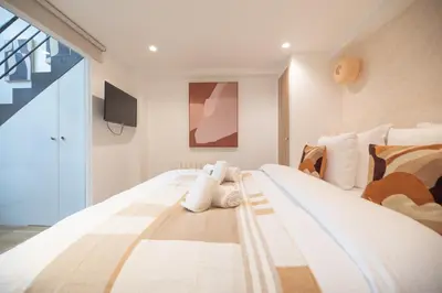 Un ou plusieurs lits dans un hébergement de l'établissement CIA - Duplex in Paris' Center