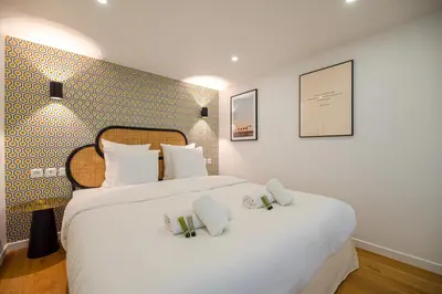 Un ou plusieurs lits dans un hébergement de l'établissement CIA - Spacious Duplex, Grands Boulevards
