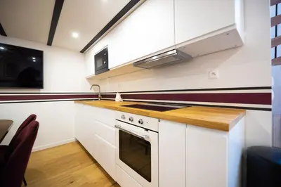 Cuisine ou kitchenette dans l'établissement CIA - Spacious Duplex, Grands Boulevards