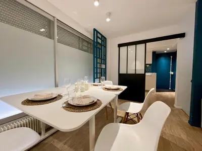Coin salon dans l'établissement Apt 4 Guests Moderne Place Breteuil