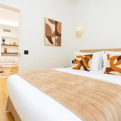 Un ou plusieurs lits dans un hébergement de l'établissement CIA - Elegant Flat Sentier, Grands Boulevards